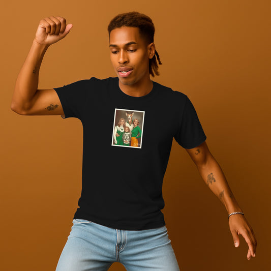 A man wearing a black t-shirt with a graphic design on it is standing with his fist raised in the air.