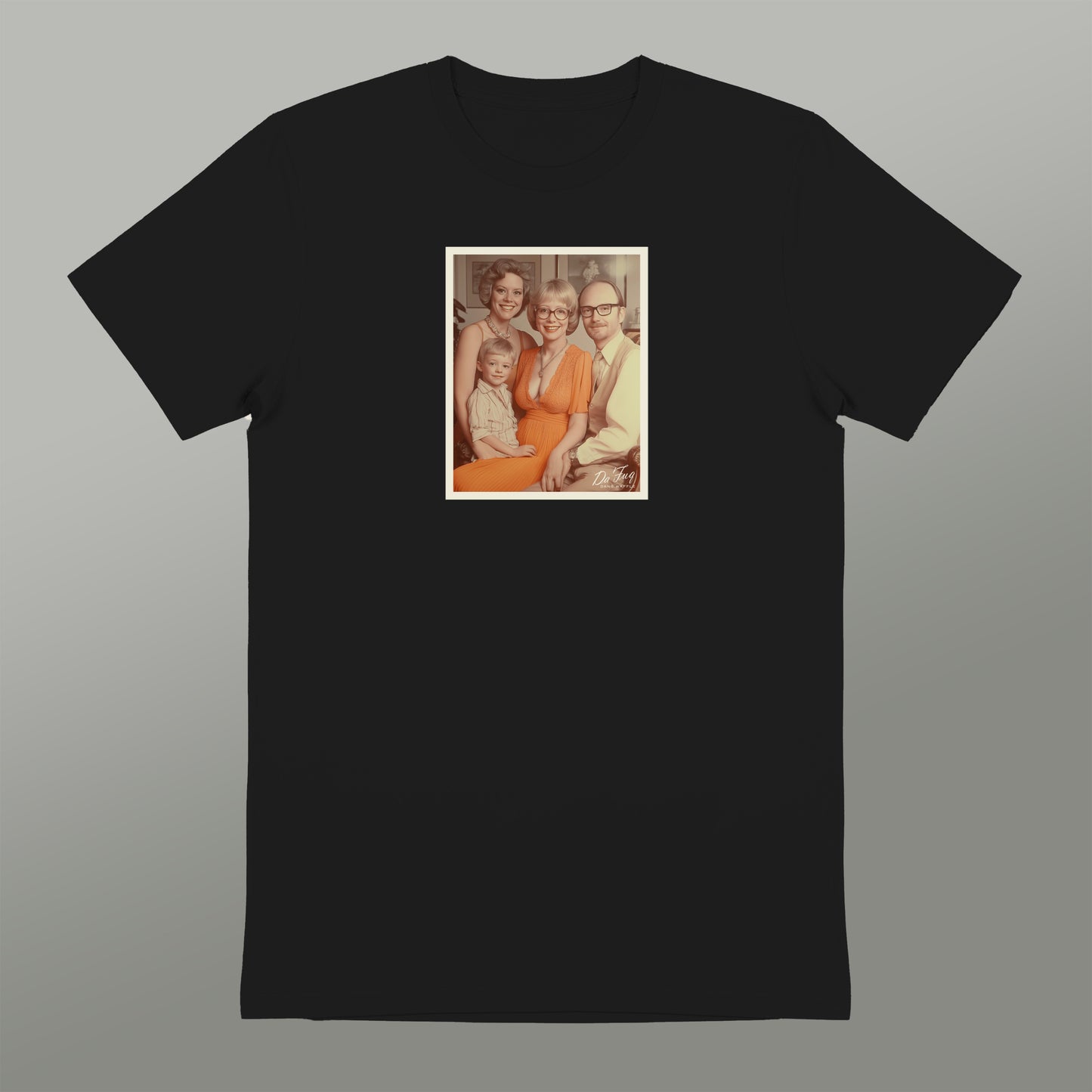 A black t-shirt with a framed photograph of a family, including a woman, a child, and two other individuals, displayed on the front.