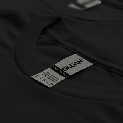A close-up view of a black t-shirt with a GILDA soft stretch label attached to it.
