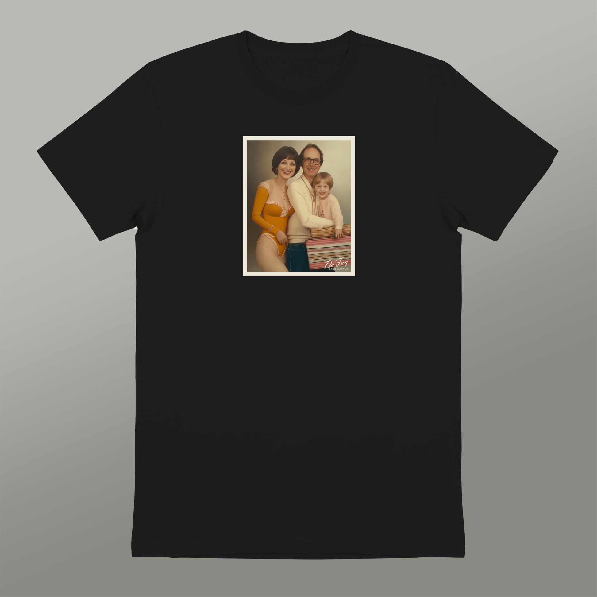 A black t-shirt with a framed photograph of a family, including a woman, a man, and a child, displayed on the front.