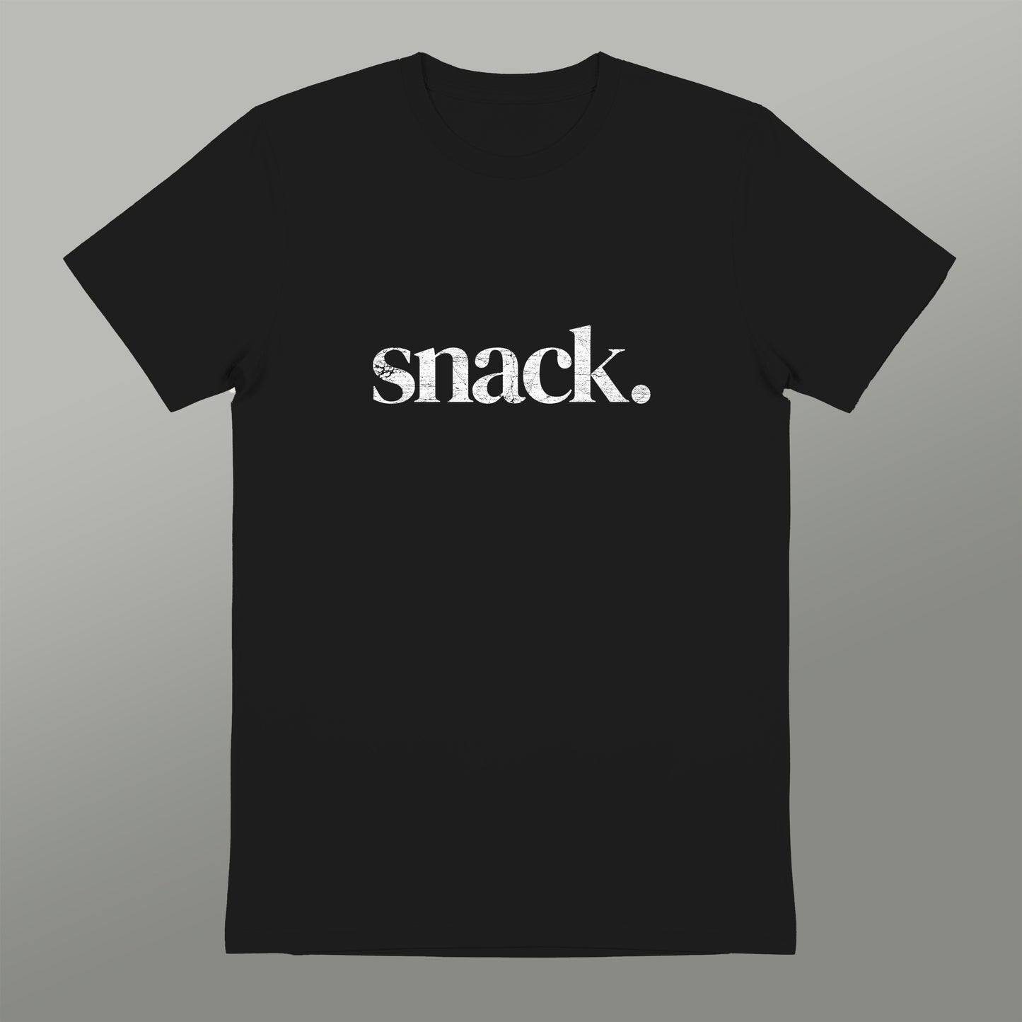 A black t-shirt with the word "snack" printed in white text.