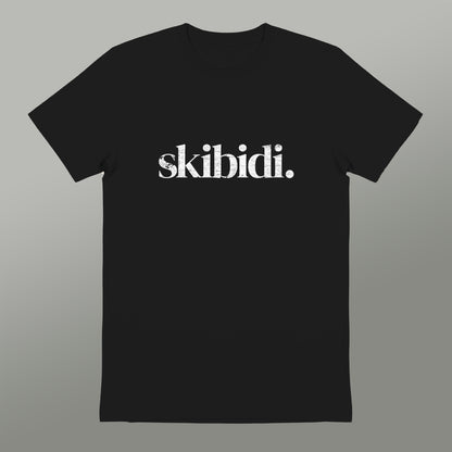 A black t-shirt with the text "skibidi" printed on it in white.