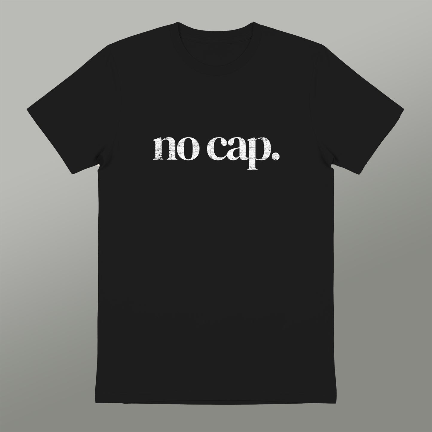 A black t-shirt with the text "no cap" printed on it in white.