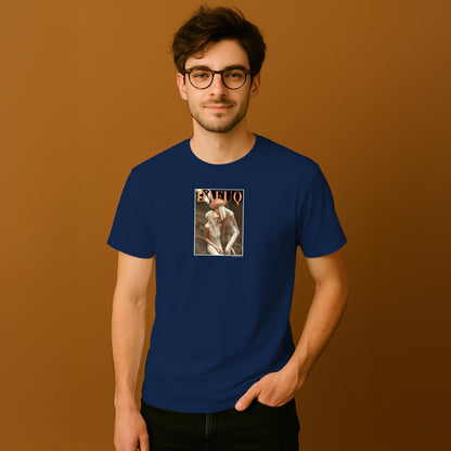 A man wearing a navy blue t-shirt with a graphic design on it, standing against a brown background.