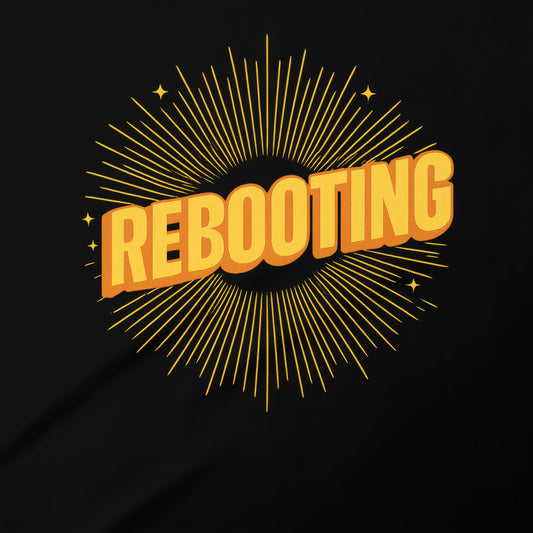 Rebooting Graphic Tee with Radiating Starburst Design